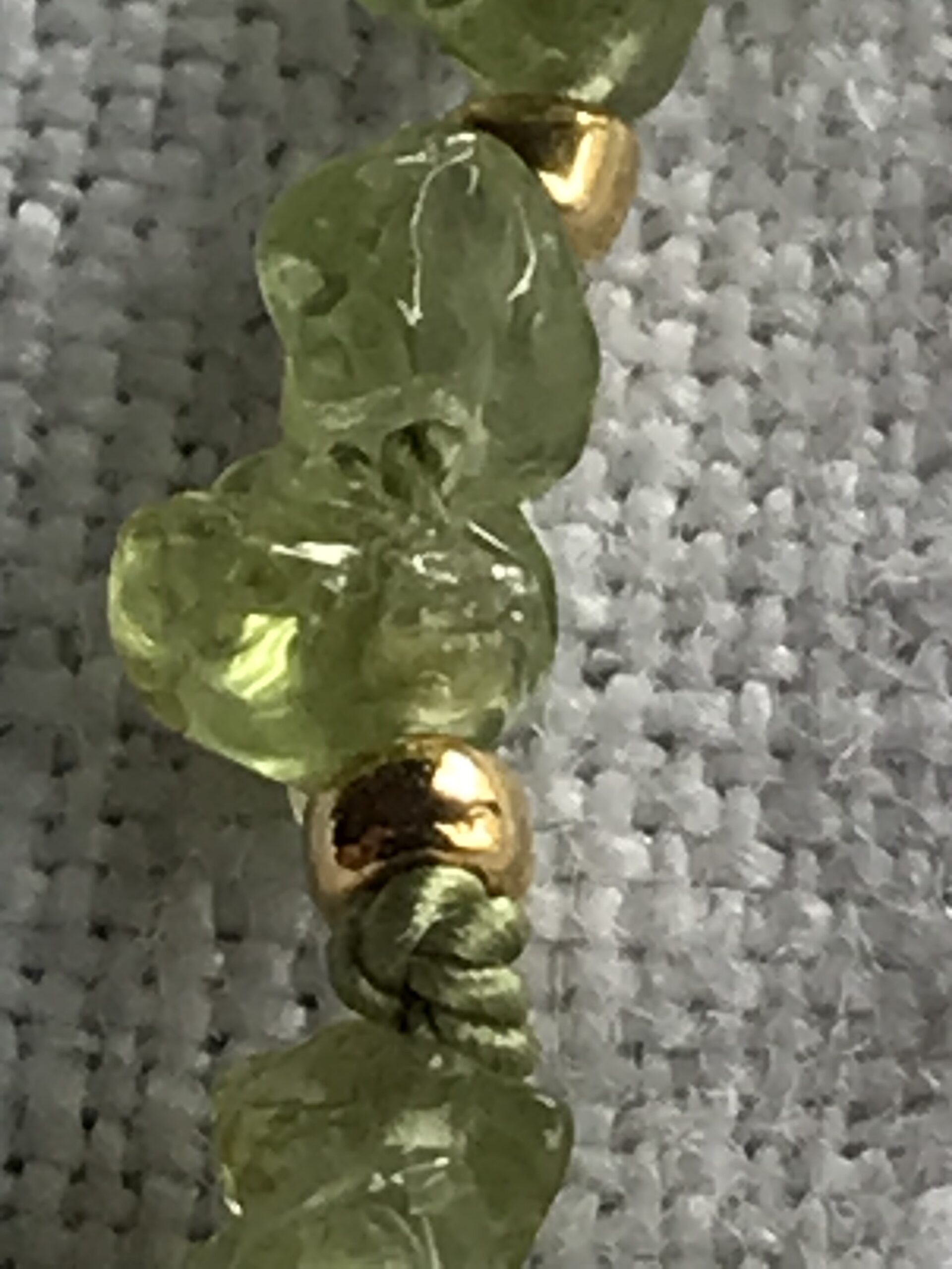 Sold – Green bead bracelet on silk thread